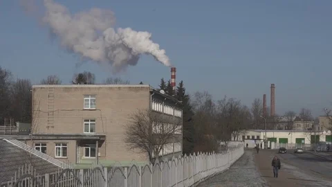Factory. The smoke comes from the chimney, blue sky, air pollution 動画素材 84857464