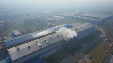 Factory smoke pollution aerial pull back shot Stock Footage 62497743