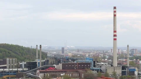 Factory smoke stacks, heating plant of the city of Ostrava, black coke Stock Footage 85500712