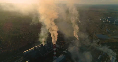 Factory Smokestack Spewing Out a Stream of Smoke. Plant Pipes Pollute the Stock-Footage 225239441