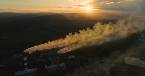 Factory Smokestack Spewing Out a Stream of Smoke. Plant Pipes Pollute the Video stock 256285459