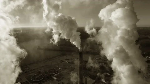 Factory Smokestacks, Steam or Smoke Swirling in Morning Sunlight Stock Footage
