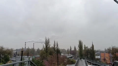  factory with smoking chimneys against the backdrop of residential buildings, di Stock Footage 269358695