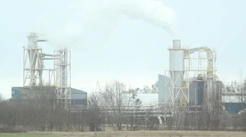 Factory with smoking chimneys Stock Footage 10860859