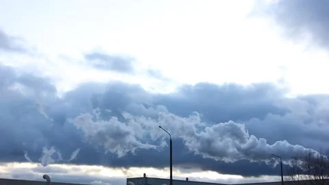 Factory smoking pipes on a cloudy gray day Stock Footage 123772802