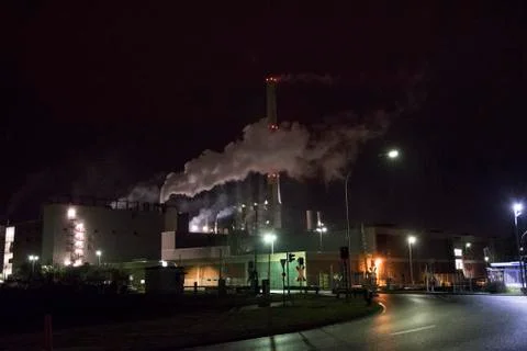 Factory with steam Stock Photos