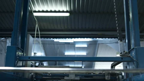 Factory storehouse lifting machine working process at technological storage Stock Footage 169891868