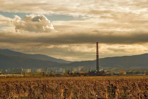 Factory at sunset Stock Photos