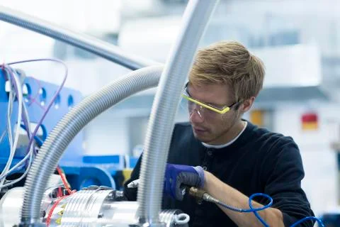 Factory technician testing network cables Stock Photos