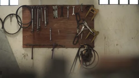 Factory tools hanging on the wall Stock Footage 264245761