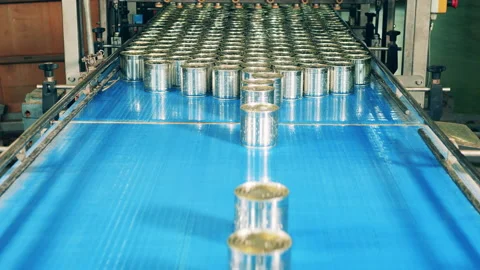 Factory transporter with a batch of tin cans Stock Footage 148624779