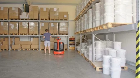 Factory warehouse filled with huge amount of white pails Stock Footage 248362947