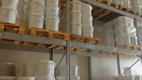 Factory warehouse filled with huge amount of pails and barrels Stock Footage 248364631