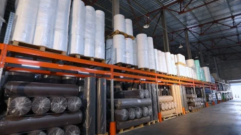 Factory warehouse, large modern warehouse. Polyester in stock. Beautiful bright Video stock 116969115