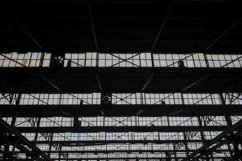 Factory windows opened sequentially. Factory background Stock Photos