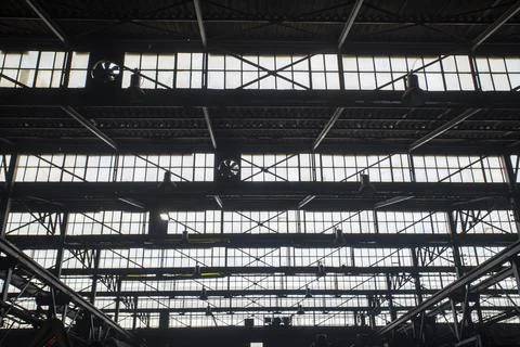 Factory windows opened sequentially. Factory background Stock Photos