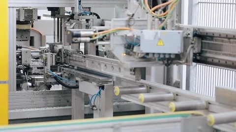 Factory Work on the production of PVC windows. PVC window production technology. Vídeo Stock 129383521