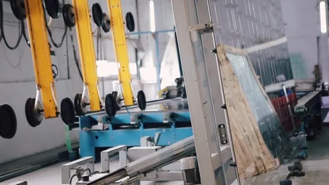 Factory Work on the production of PVC windows. Vídeos de archivo 129384191
