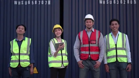 Factory worker and engineer at cargo containers, Dock workers team in a shipyard Stock Footage 168956188