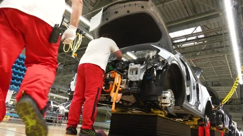 Factory Worker Assembling Car on Production Line Stock-Footage 346225018
