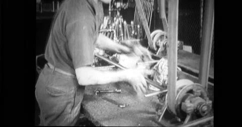 Factory worker assembling steering gear Stock Footage 43396698