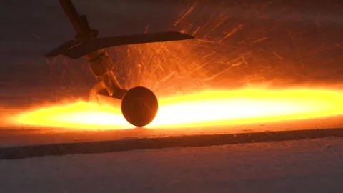 Factory worker burns stone with a burner Stock Footage 141413525
