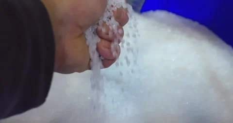 Factory worker checking plastic granules quality Stock Footage 302278407