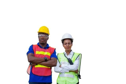 Factory worker with clipping path smiling with arms crossed on white background Photos