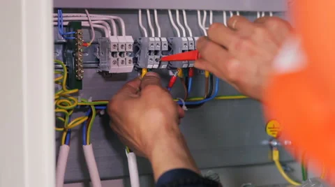 Factory worker connecting electrical wires Stock Footage 61841405