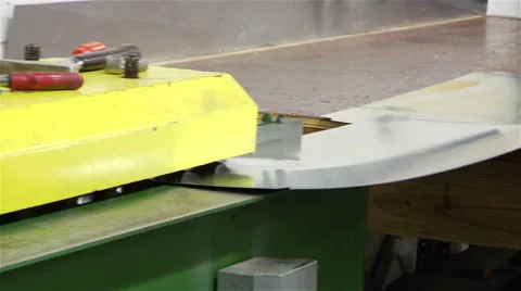 Factory worker creates edging on metal - close-up shot Stock Footage 42958272