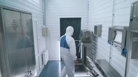 A factory worker disinfects hands Stock Footage 145694254