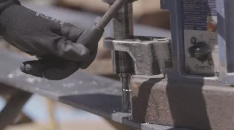 Factory worker drilling through steel Stock Footage 56716584