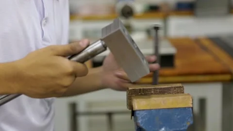 Factory worker mounting machine pieces Stock Footage 133438182