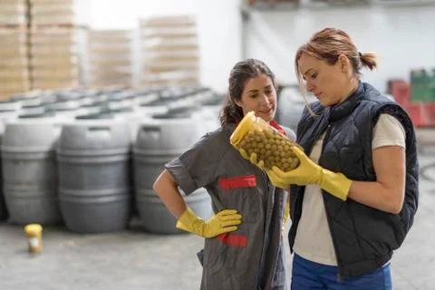  Factory worker in olives site Stock Photos