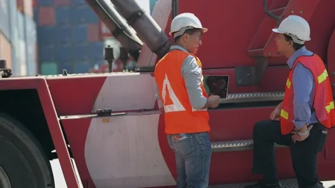 Factory worker people men standing in front of containers logistic in warehouse. Video stock 234263868