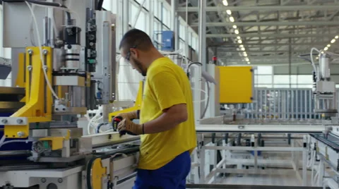 Factory worker preparing his machine Stock Footage 63031839