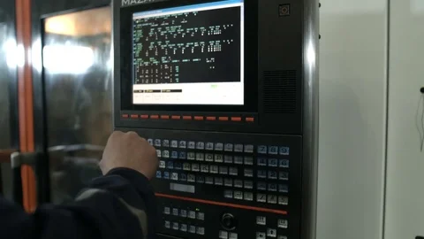 Factory worker programming computer Stock Footage 71024104