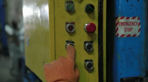 Factory worker pushing buttons Stock Footage 49385575