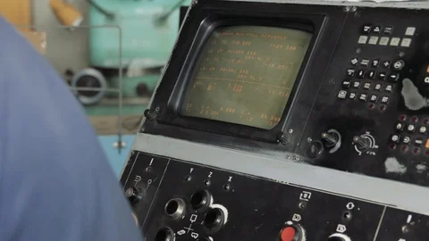 Factory Worker is Setting Up CNC Lathe Machine in Factory Stock Footage 111247483
