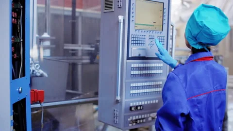 Factory worker stand near control panel Stock Footage 95903907