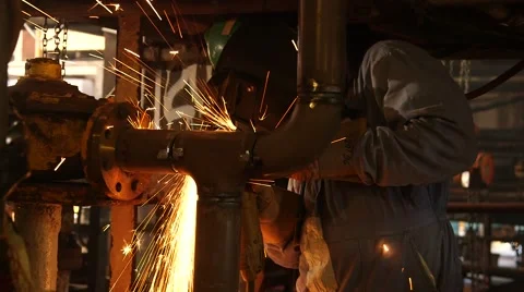 Factory Worker Using Electric Grinder Stock Footage 63988374
