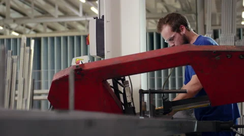 Factory worker using machines while at work Stock Footage 63032111