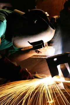 Factory worker welding Stock Photos