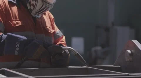 Factory worker welding steel Stock Footage 56717339