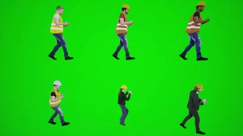 Factory workers and engineers walking in the factory and looking at the phone Stock Footage 252661732