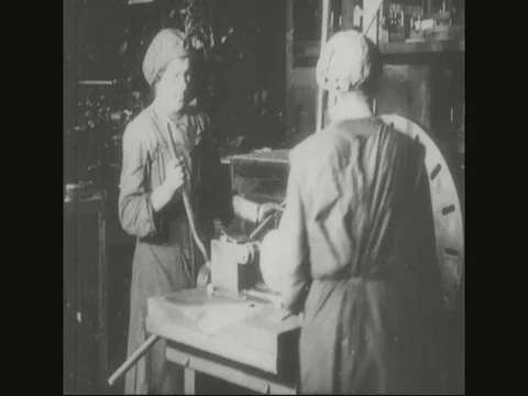 Factory workers are giving shape to shell - 1918 Stock Footage 83657460