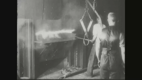 Factory workers are reheating shell to red hot and giving shape to shell - 1918 스톡 동영상 83657501