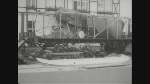 Factory workers are unloading material - 1918 Stock Footage 83657607