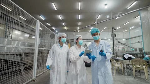 Factory Workers with Gadget Stock Footage 331839654