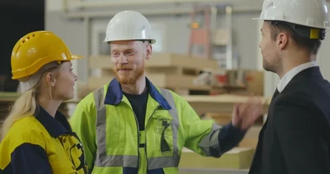 Factory workers giving high five Stock Footage 112054367